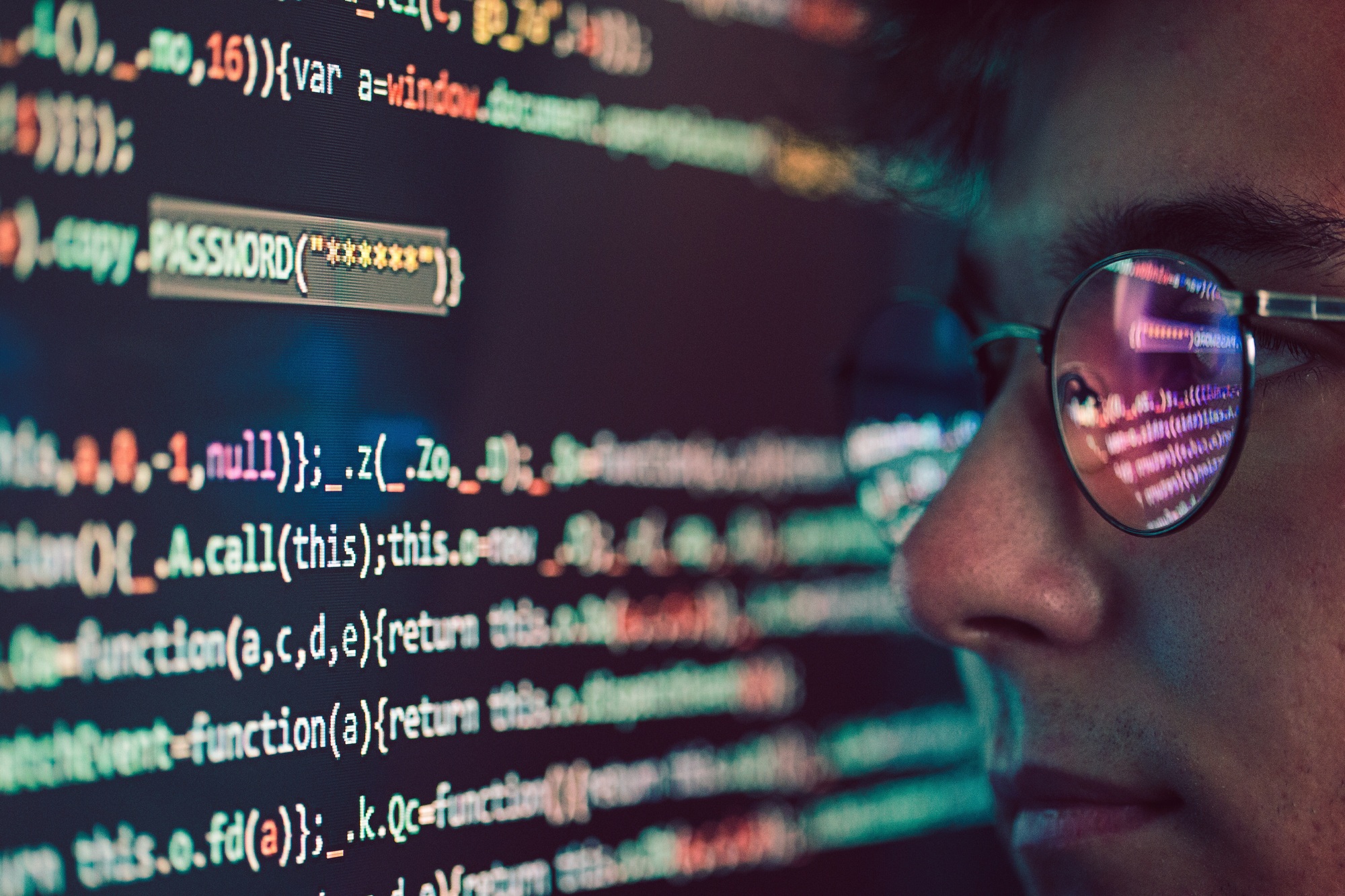 Hacker using computer, smartphone and coding to steal password and private data. Screen with code